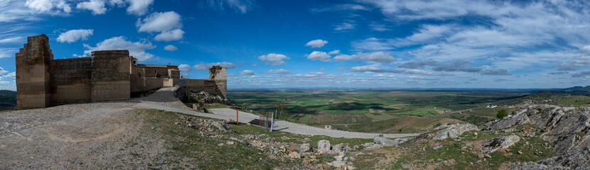 Panoramic view from historical ruins of Alcazaba de Reina overlooking the hills