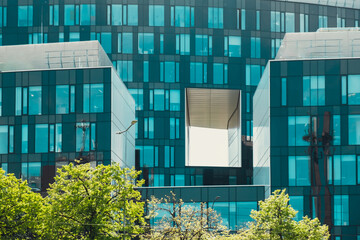 Modern glass commercial exterior of office building architecture. Window covered abstract building...
