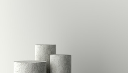 Three concrete cylinders creating a pedestal on a minimal background