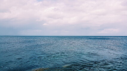 Obraz premium Quiet seascape with clouds