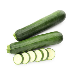 Whole and cut fresh zucchinis isolated on white, top view
