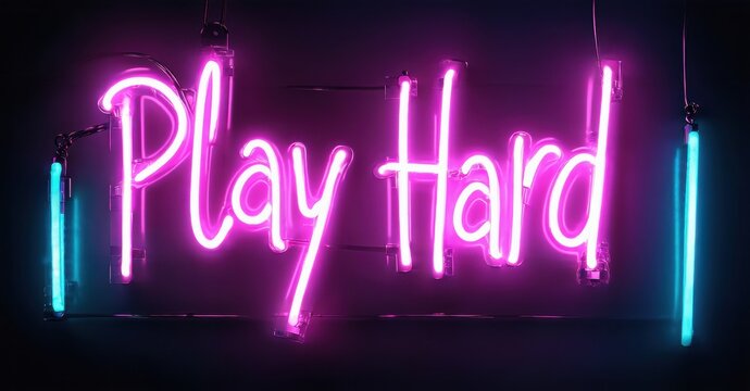 Bright pink neon sign displays Play Hard. Dark background emphasizes glowing text. Modern aesthetic, vibrant colors present.