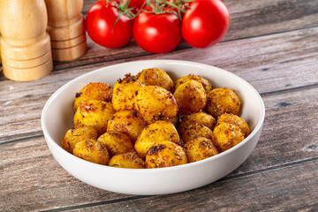 Baked small baby potato with herbs