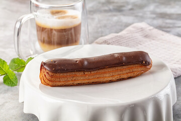 Gourmet chocolate eclair with icing