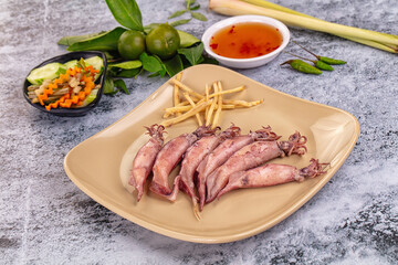 Boiled wild mini calamari snack