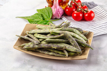Raw green bean strips heap