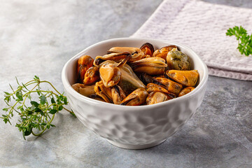 Peeled mussels heap in the bowl