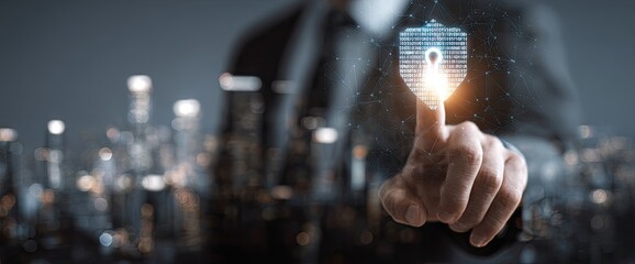 Businessman activating a virtual shield for cybersecurity and data protection.