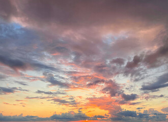 Fantastic sky. Bright landscape with sky, sun and gold, red and dark clouds