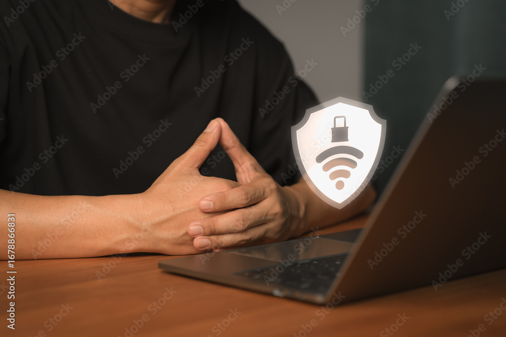 Poster cybersecurity and wifi protection concept. a shield with a lock and wireless symbol on laptop comput