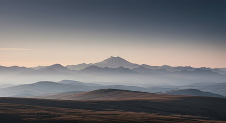 Scenic Mountain Range Landscape with Hazy Valley View