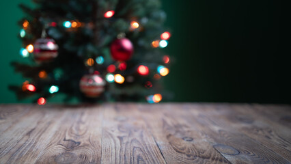 A cozy wooden surface is set against a blurred Christmas tree adorned with colorful lights and ornaments. The scene embodies the joyful spirit of the holiday season, perfect for a postcard.