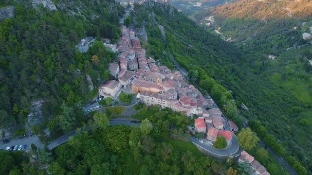 Drone footage captures the Sainte Agnes, officially recognized as one of France's most beautiful villages. This medieval hilltop village, nestled in the Alpes-Maritimes region, offers breathtaking pan