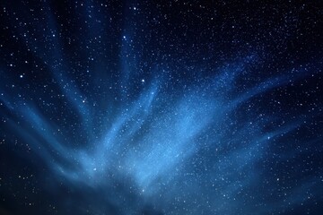 Obraz premium Beautiful blue starry sky with nebulae and star clusters. Ideal for astronomy, science, or fantasy background images.