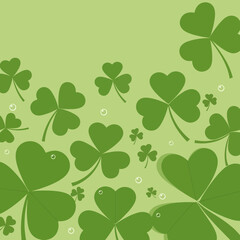 Green shamrocks scattered across a light green background.