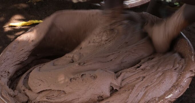 Senufo woman prepairing shea in a karit&eacute; factory, Tcheregnimin, Ivory Coast