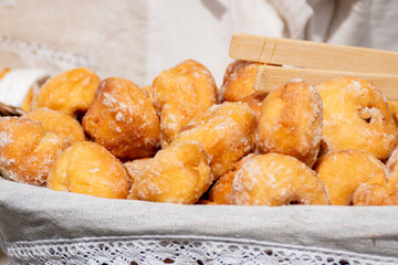 A basket full of homemade sugar coated donuts The Essence of Homemade Baking