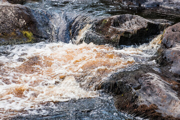Akhinkoski Waterfalls or Ruskeala Waterfalls on the Tohmajoki River. Russia, Republic of Karelia
