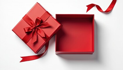 Open empty red gift box with satin ribbon bow on white background. Top view flat lay composition. Festive celebration, surprise, holiday present, wedding, birthday, Valentines day, gift packaging.