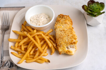 baked haddock  with fries and tarter sauce