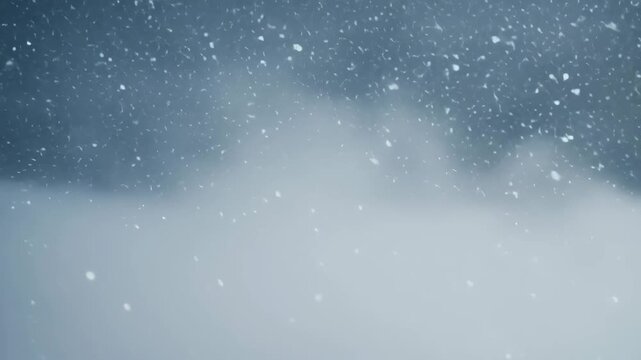Soft snowflakes drifting in foggy cold air, creating quiet and peaceful wintertime natural atmosphere.