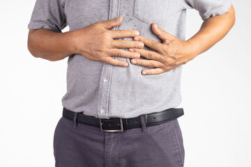 Senior man feeling Chest Pain , Angina disease.