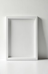 Modern sleek minimalist white photo frame with clean design. Ideal for displaying photos, art graphics. Features simple, elegant look suitable for various interior styles. Use for mockups, portfolio