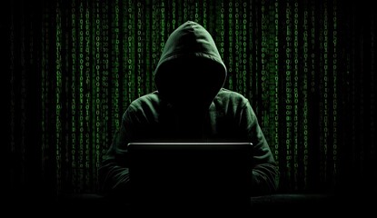 Anonymous Hacker in Hoodie Working on Laptop with Green Code.