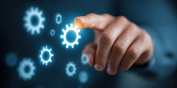 Hand activating a glowing gear, representing technological innovation and progress.