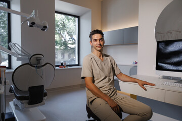 A Young Professional Works Effectively in a Modern, Aesthetic Dental Office Environment