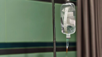 Saline IV drip Infusion bottle,Saline bag for Patient in hospital ,Healthcare concept,Selective focus,