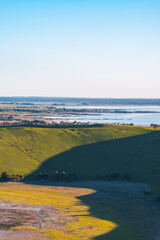 Scenic view of the field by the lake from the hill top on a sunny day, Red Rock, Victoria, Australia