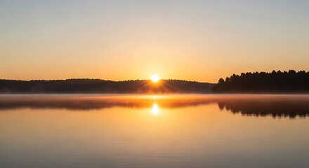 Obraz premium Sunrise over a Calm Lake.