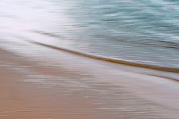 Shoreline and tide blend together in a delicate motion of color and texture.