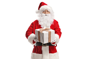 Santa claus holding a big present box