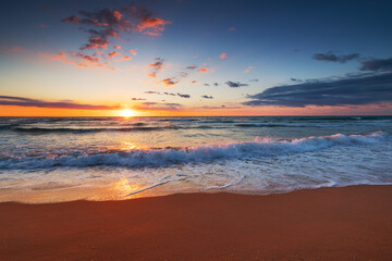 Beautiful cloudscape over the sea horizon and tropical beach scenic sunrise