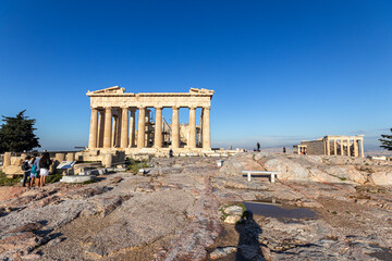 Athens, Greece. The Parthenon on the Acropolis, built between 447 and 432 BC under Pericles, dedicated to Athena Parthenos, shining under a warm blue sky
