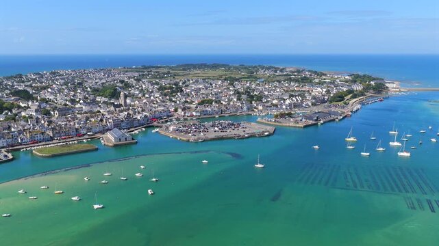Aerial view of the french village of Le Croisic in Guerande France with sailboats parked in the bay 