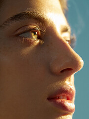 Close-up portrait of a woman with natural makeup and healthy skin. © Shuguang