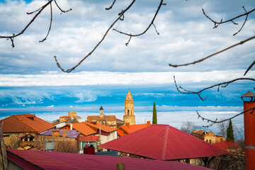 Beautiful view of St. George's Church tower rising above all the village rooftops