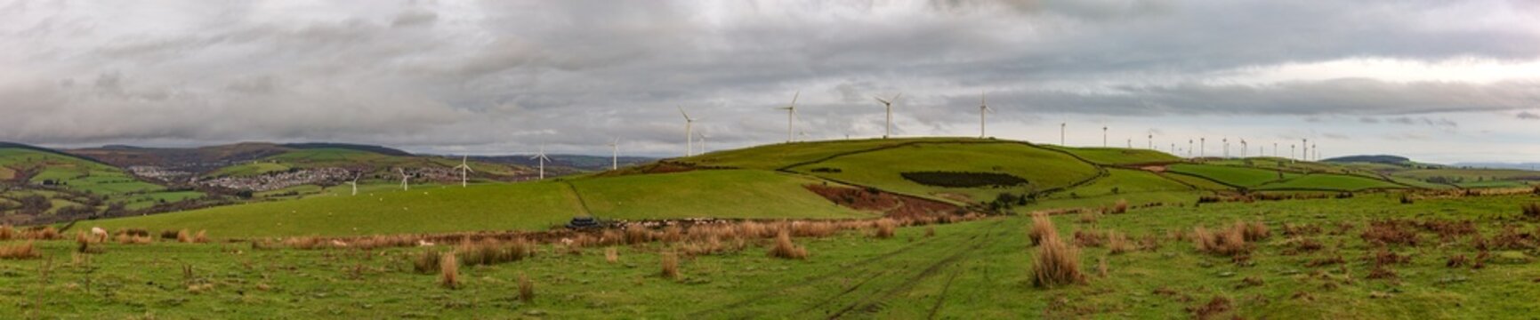 View across moorlands towards Taff Ely wind farm, Mynydd Maendy on the Taff Ely Ridgeway Walk near Hendreforgan in Rhondda Cynon Taf, Wales, UK