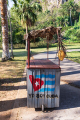 Small modest wooden mobile product stand with Cuban flag and the inscription I Am Cuba in Vinales...
