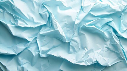 Obraz premium Soft pastel blue crumpled paper abstract background texture