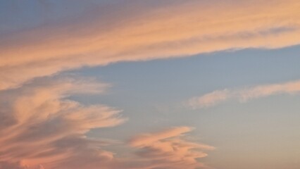 Atmospheric sunset with orange and blue tones, magical sky spectacle
