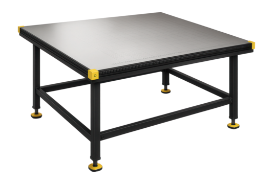 Cutting table with a large flat surface and integrated measuring grid for textile factories.