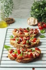 Freshly made bruschetta sandwiches - traditional dish of Italian cuisine