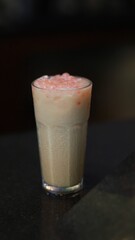 Delicious milk tea with popcorn topping
