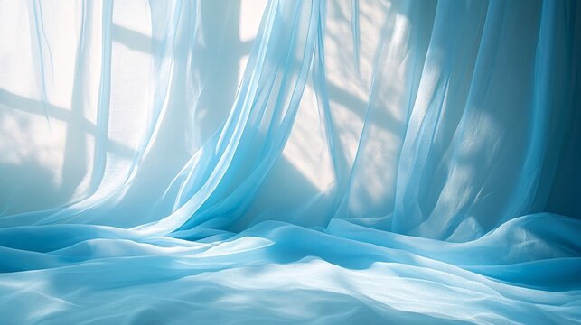 Abstract background of soft blue tulle in morning sunlight