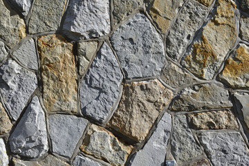 Natural rock background wall with mortar