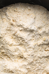 Obraz premium Raw chin-chin dough being mixed, process of making chin chin achomo or klenat
